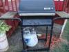 BBQ GRILL WITH FULL PROPANE TANK $75.00